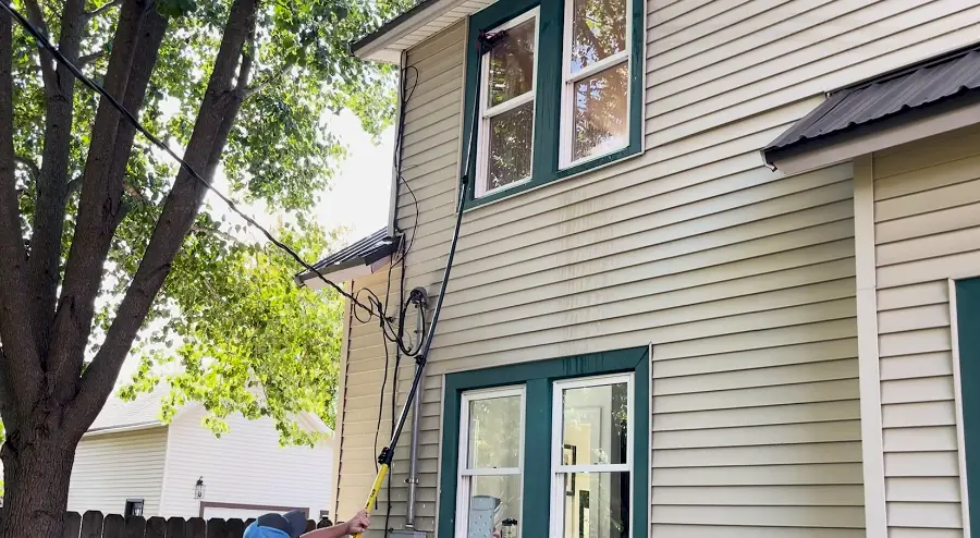 Two-story residential window cleaning with water-fed pole in San Clemente, CA