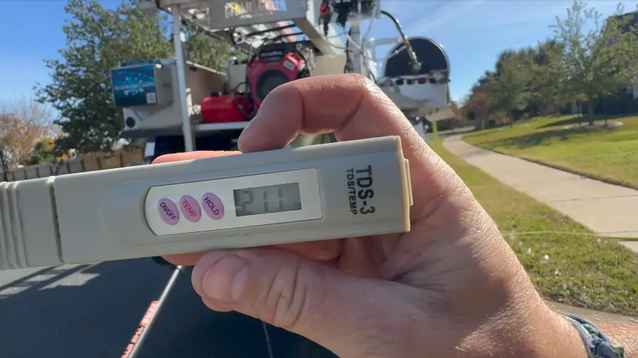 Testing water hardness before hard water spot removal in San Clemente, CA
